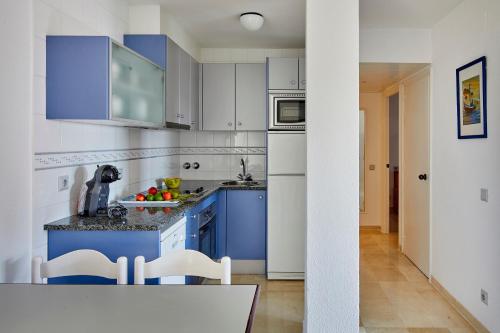 Dapur atau dapur kecil di Apartamentos Centremar