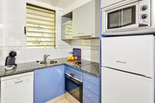 Dapur atau dapur kecil di Apartamentos Centremar