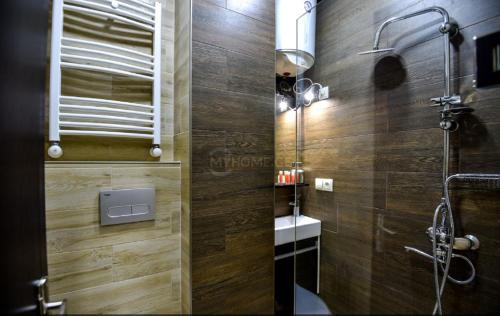A bathroom at Freedom Square Apartment