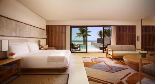 Postel nebo postele na pokoji v ubytování Nobu Hotel Los Cabos