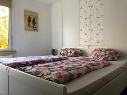 Postel nebo postele na pokoji v ubytování Ferienanlage Geisingblick