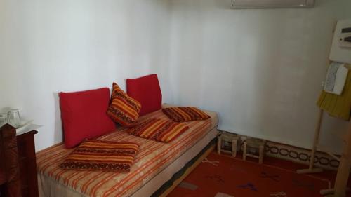 Una cama o camas en una habitación de Riad Medina