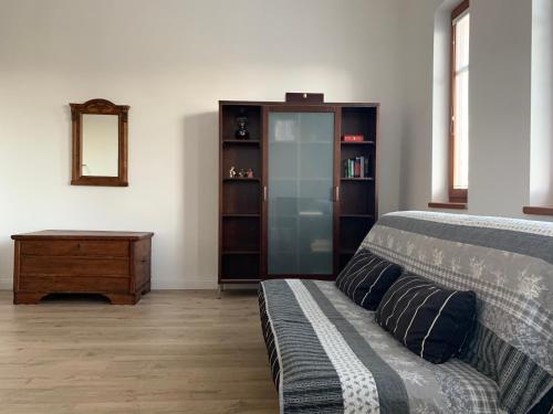 Postel nebo postele na pokoji v ubytování Romantika v Tatrách - apartmán Vila Hollý