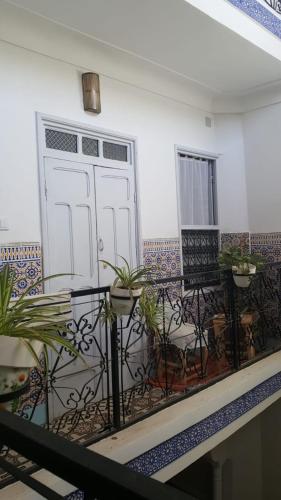 Un balcón o terraza en Riad Medina