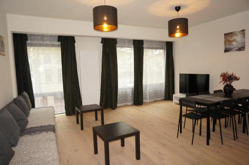 Una televisión o centro de entretenimiento en Brial apartment 2 bedrooms,