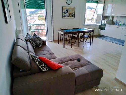 a living room with a couch and a table at CASA BILO in Ancona