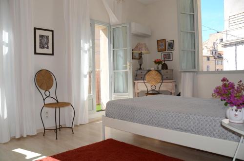 Un ou plusieurs lits dans un hébergement de l'établissement Bel appartement Villeneuve Lès Avignon