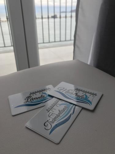 two toothbrushes sitting on top of a table at Vento di mare in Procida