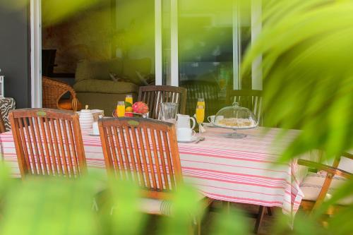 a table with a plate of food on it at Villa Golf Lanzarote in Costa Teguise