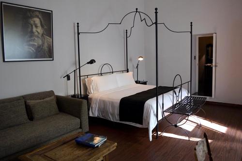 Postel nebo postele na pokoji v ubytování Casa de Los Olivos