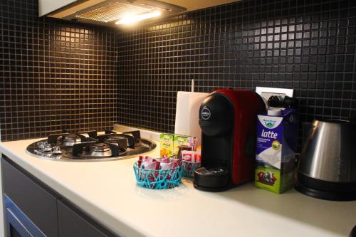 Set per la preparazione di tè e caffè presso Cosenza Luxury Apartment