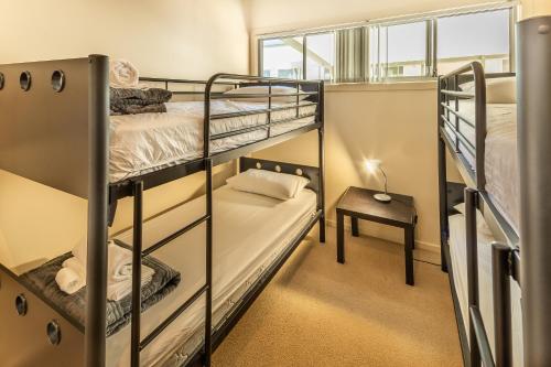 Letto o letti in una camera di Ingenia Holidays Byron Bay