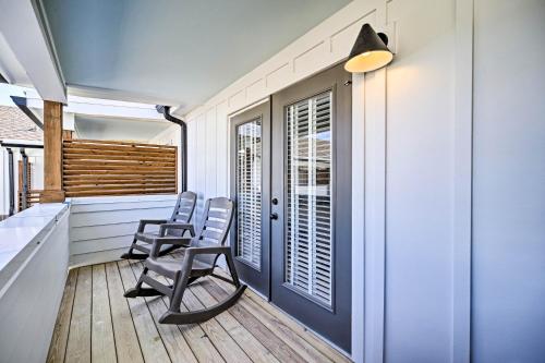 a row of chairs on the porch of a house at Downtown Modern Luxury - Great location in Chattanooga