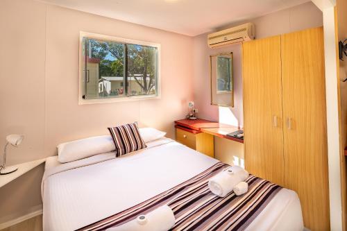 Letto o letti in una camera di Ingenia Holidays Byron Bay