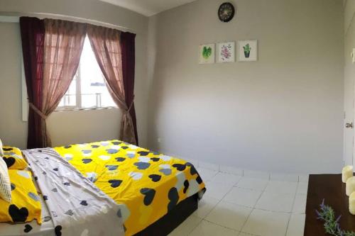 Katil atau katil-katil dalam bilik di DinDas Family Stay @ Labuan