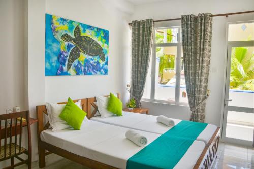 Postel nebo postele na pokoji v ubytování Di Sicuro Tourist Inn