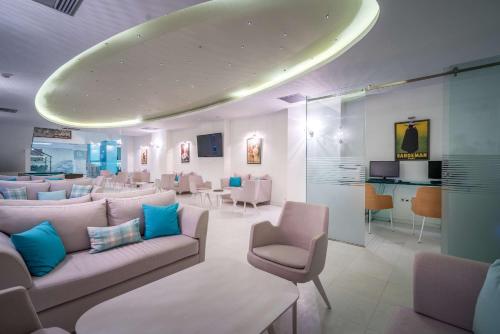 Zona de estar de Galaxy Beach Resort BW Premier Collection