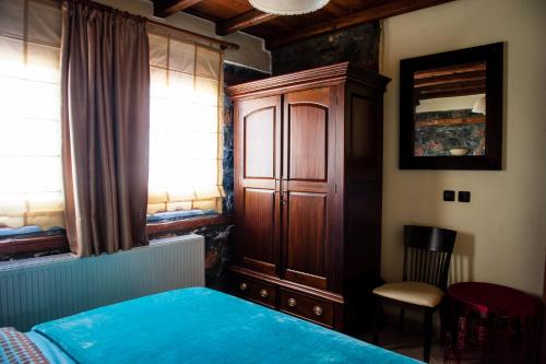 Łóżko lub łóżka w pokoju w obiekcie Eva Guesthouse