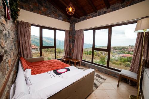 Posteľ alebo postele v izbe v ubytovaní Eva Guesthouse
