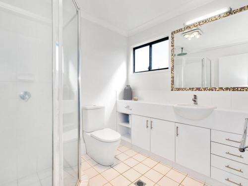 A bathroom at Casuarina Escape by Kingscliff Accommodation