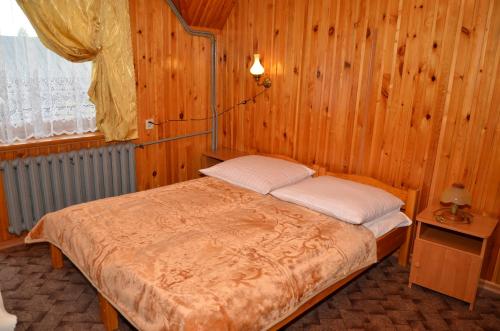 Posteľ alebo postele v izbe v ubytovaní Babiarzowie