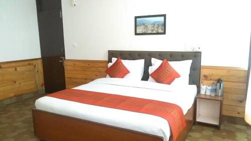 Postel nebo postele na pokoji v ubytování Highland Village Resort