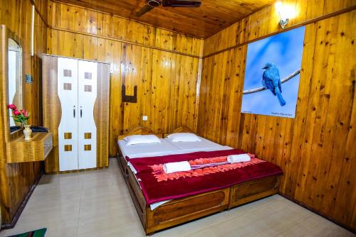 Postel nebo postele na pokoji v ubytování Aranya Jungle Resorts