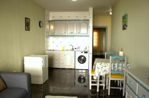 Kuchyňa alebo kuchynka v ubytovaní Apartamentos Casa Junonia