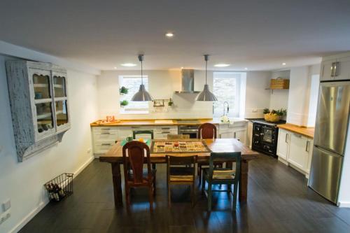 A kitchen or kitchenette at La Postoca
