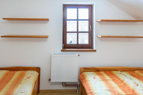 Cama o camas de una habitación en Apartments In