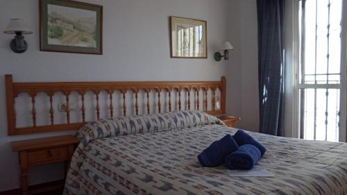 Postel nebo postele na pokoji v ubytování PINOS 11 MENYBER