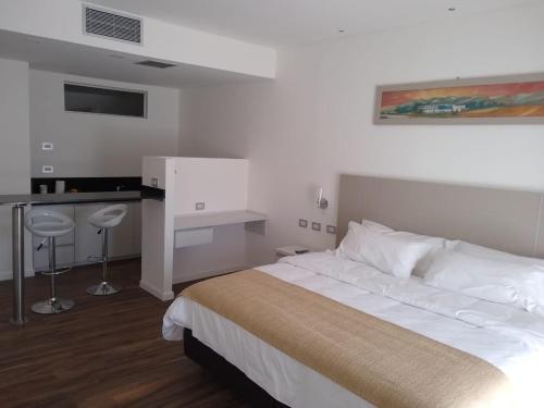 Ένα ή περισσότερα κρεβάτια σε δωμάτιο στο Hotel Cantera Respira Campo