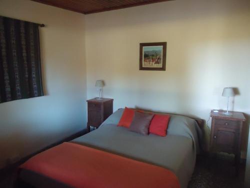Łóżko lub łóżka w pokoju w obiekcie Puesto Las Totoras