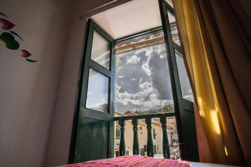 Postel nebo postele na pokoji v ubytování Hotel Cusco Plaza Saphi