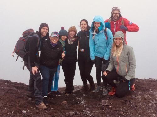 a group of people standing on top of a mountain at El Caracol in Popayan