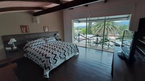 Ένα ή περισσότερα κρεβάτια σε δωμάτιο στο Hotel Uritorco