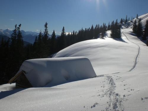 a snow covered tent on a snow covered mountain at Appartement Hartl in Filzmoos