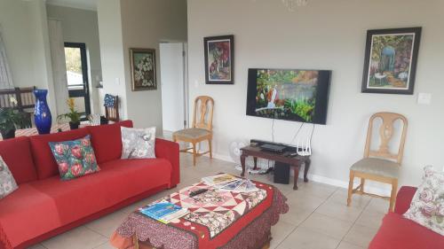 Ruang duduk di Knysna Paradise Guesthouse
