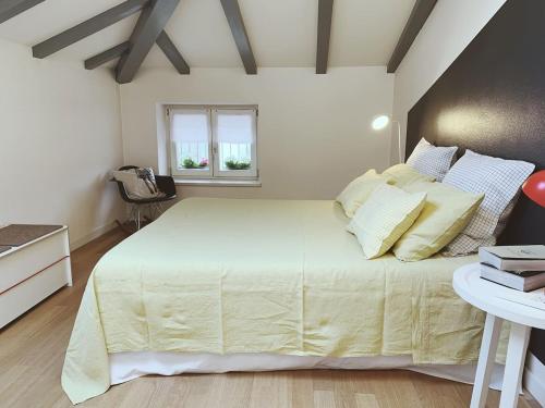 Posteľ alebo postele v izbe v ubytovaní Buonconsiglio apartment
