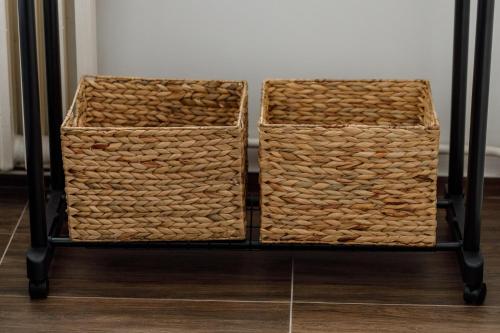 two baskets sitting on a metal rack at Kristall Apartments 2 Panorama in Šabac