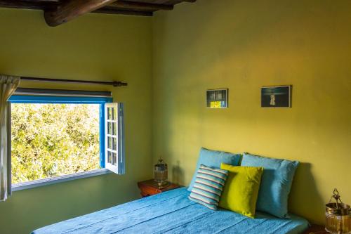 Ένα ή περισσότερα κρεβάτια σε δωμάτιο στο Casa Santa