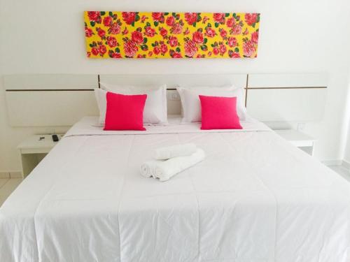 Ліжко або ліжка в номері Residencial Mar da Galilei - Apartamento 20A