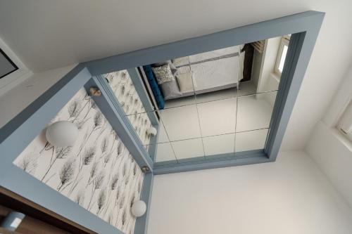 an overhead view of a room with a ceiling at Kristall Apartments 2 Panorama in Šabac