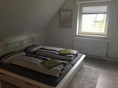 Ένα ή περισσότερα κρεβάτια σε δωμάτιο στο Lüneburger Heide
