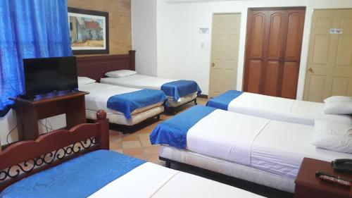 Letto o letti in una camera di Hotel Castillo Real