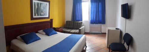 Letto o letti in una camera di Hotel Castillo Real