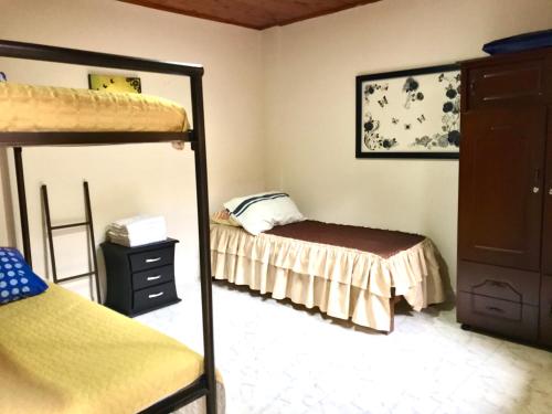 Postel nebo postele na pokoji v ubytování Casa Santa Isabel