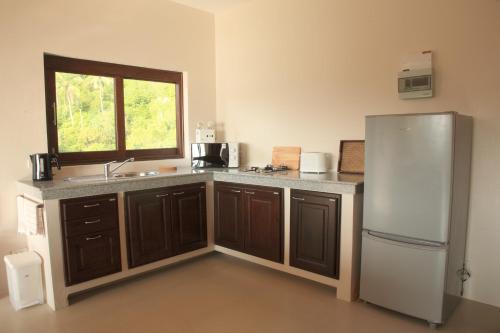Η κουζίνα ή μικρή κουζίνα στο Koh Phangan Pavilions Serviced Apartments