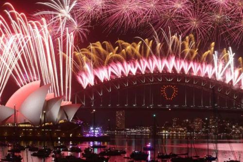 a firework display over the sydney opera house and the sydney at Ensuite King Single Room - AC - Next to Central - Closely Located to Almost Sydney Must Seen Spots in Sydney