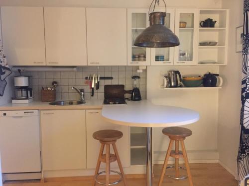 Kuchyň nebo kuchyňský kout v ubytování Cozy studio at the center of Lahti